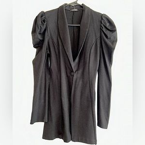 Blazer with ruched shoulder pads.